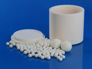 Ceramic grinding balls and grinding jars