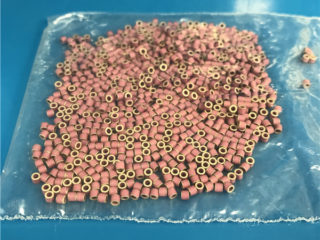 Pink Metallized Alumina Ceramic Ring Bushing|A metallized alumina ceramic ring bushing is a specialized ceramic component used in various industrial applications. It combines the properties of alumina ceramic with a metallized or metal-coated su…