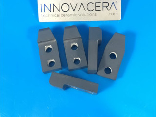 Shoe Shape Silicon Nitride Ceramic Plates|Shoe-shaped silicon nitride ceramic plates refer to ceramic plates made from silicon nitride (Si3N4) with a specific shoe-like or horseshoe-like configuration. These plates are designed with a shape that resembles the sole of a shoe or a horseshoe, typically with a curved or U-shaped profile. It is highly resistant to various chemicals and corrosion, which