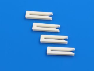 ceramic guides for fiber spinning