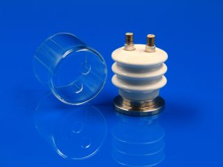Dual-pin ceramic-to-metal vacuum power feedthrough with optional quartz shield for thermal evaporation coating equipment